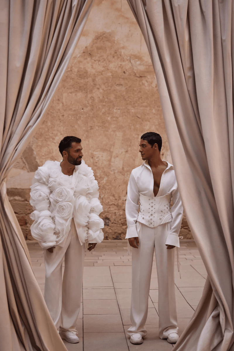 Models in gender-tailored suits