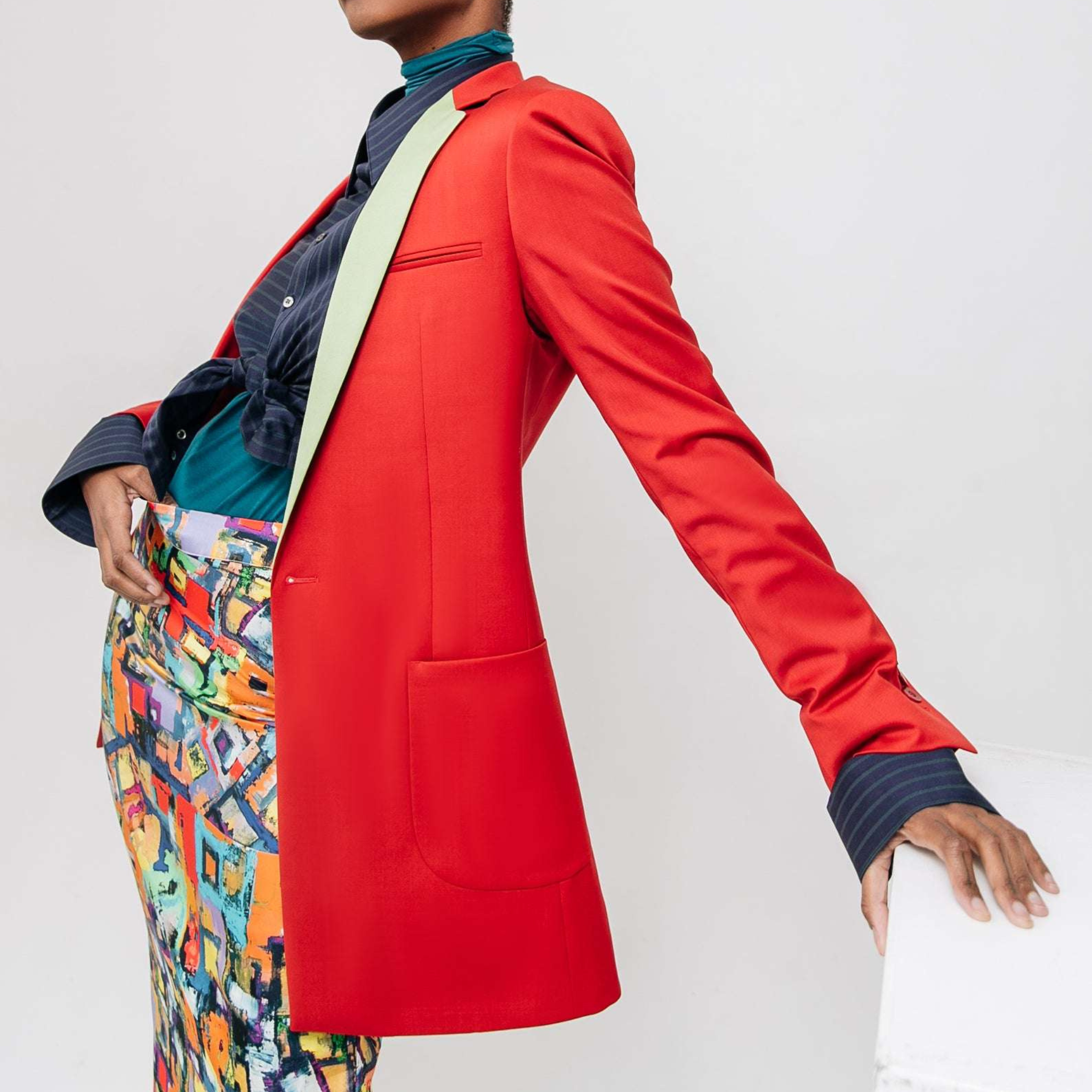 Tailory ruby red contrast lapel blazer on model standing