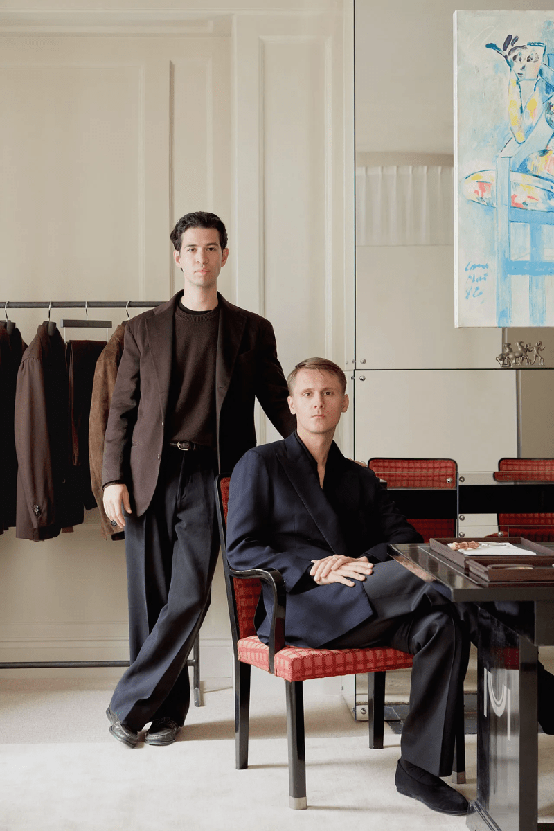 Models in bespoke jackets and trousers