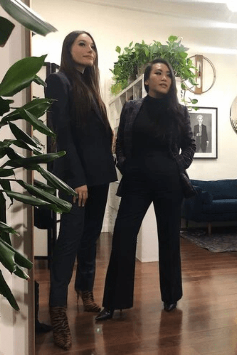 Models in bespoke business attire