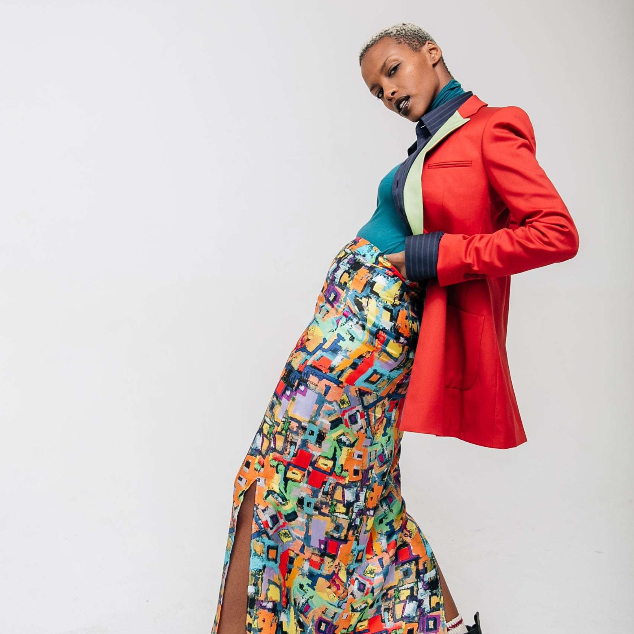 Tailory ruby red contrast lapel blazer on model walking