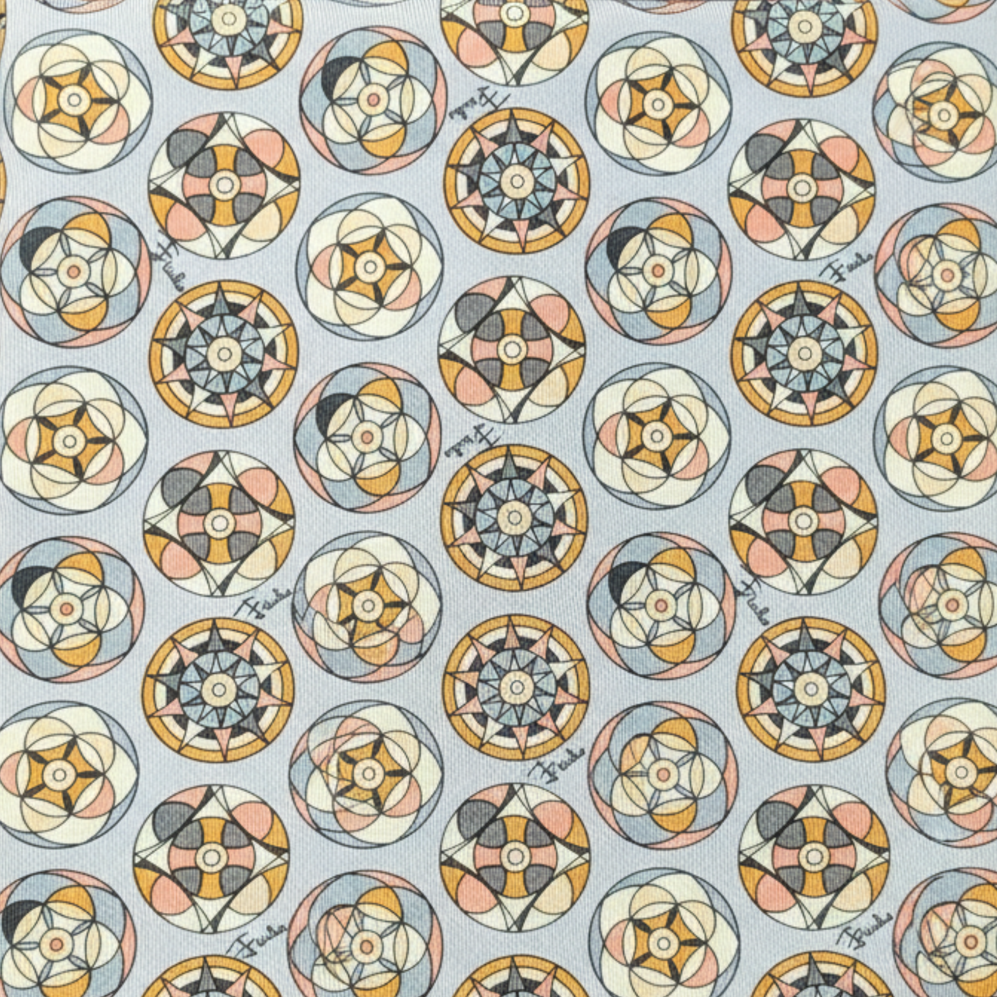 Close-up of silk tie fabric showing medallion pattern and texture