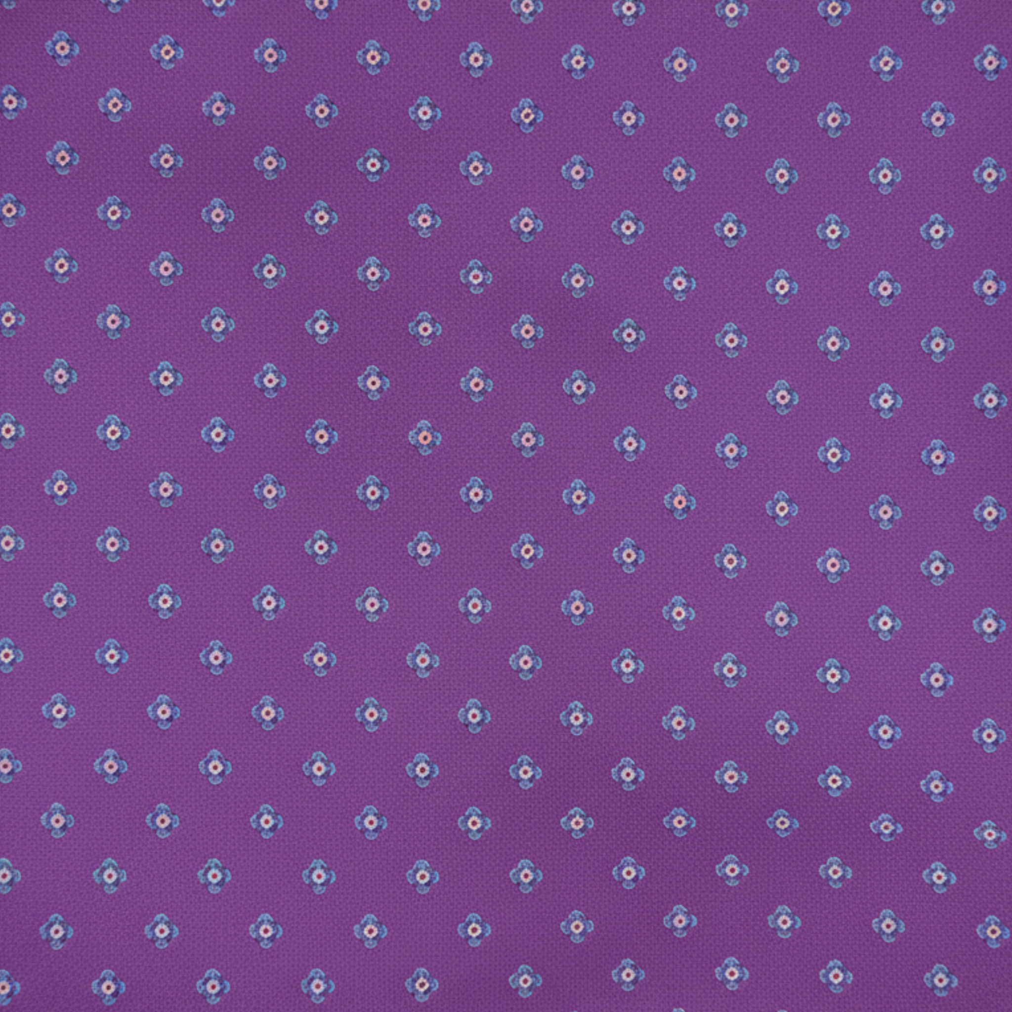 Close-up of purple silk tie fabric showing geometric pattern and texture